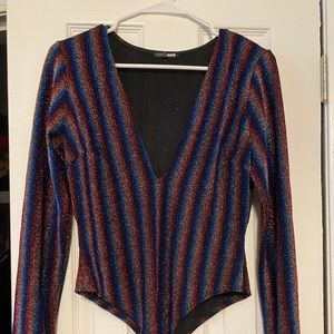 Flashy sparkly bodysuit low-cut